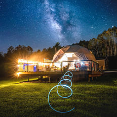 Outdoor view of a glamping tent at Valley Sky