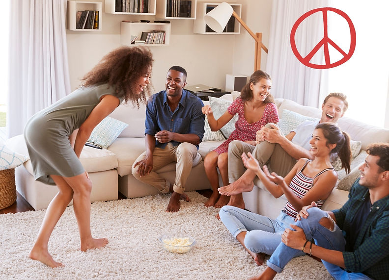 Diverse adults laughing and connecting at a sleepover party. There is a doodle peace sign in the corner of the photo.