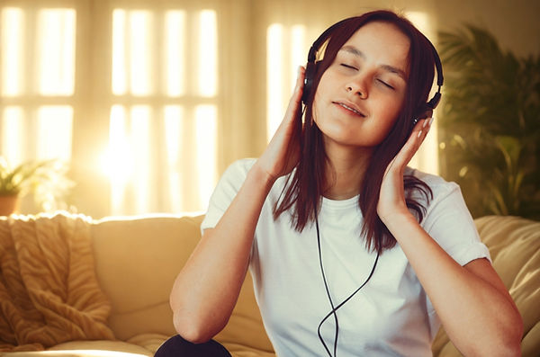 Millennial woman listening to 90s and Y2K music