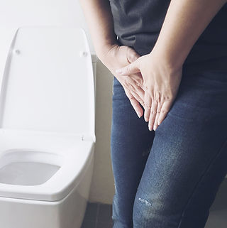 woman-holding-hand-near-toilet-bowl-health-problem-concept (1).jpg