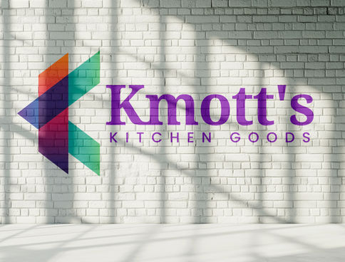 Colourful geometric logo for a kitchen goods brand, painted on a white brick wall with elegant typography.