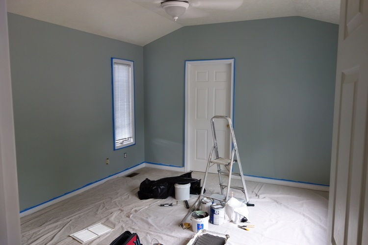 What Sets Burli Prep & Painting's Interior Painting Apart? Painting walls of bedroom.