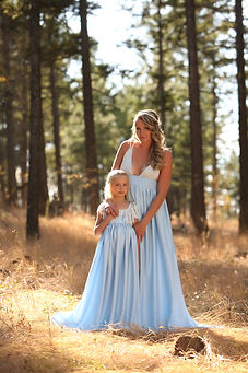 Aimee and her daughter in dresses she designed. Photo credit: Okanagan Photography