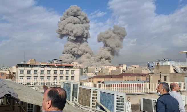 Usok sa skyline sanhi ng pagsabog sa Tehran, Iran nitong Feb. 28, 2026 matapos ang air strike ng US - AP Photo