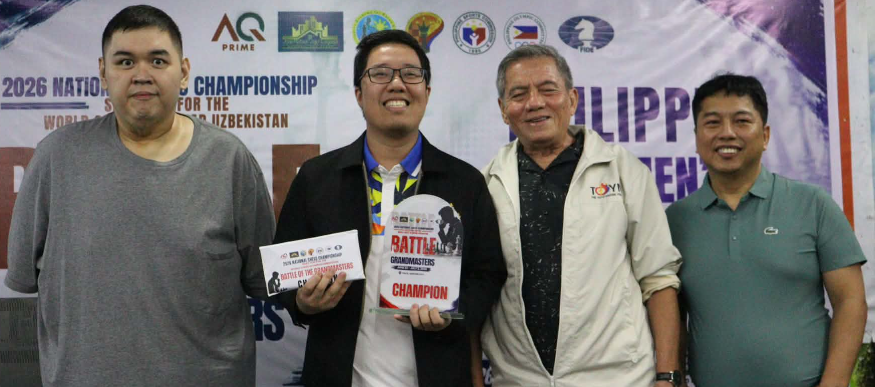 Itinanghal na kampeon si International Master Jan Emmanuel Garcia sa huling round kontra Ruelle Canino sa pagtatapos ng 2026 National Chess Championships Battle of the GM's na iginawad nina First Asia's GM Eugene Torre at Jose Rafael representative ng AQ Prime Chess at NCFP CEO GM Jayson Gonzales sa PACE Philippine Academy Chess Excellence, Mindanao Avenue Quezon City kagabi.