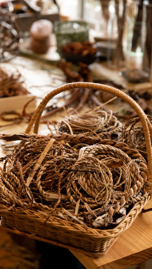 a basket of hand made string from plant fibre