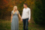 sweet couple posing at frisco commons park taking their fall family photos by jc photography and design