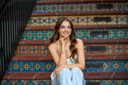 Dallas senior photography session featuring elegant architecture and soft tones