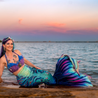 Close-up of Mermaid Luna Lagoon smiling in costume at Murrell Park