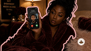 Black woman in a burgundy robe holds a phone showing a FaceTime call from Charles in a dim, cozy room.