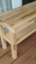 Thumbnail: handmade maple bench, light wood color with unique grain pattern, angled side view