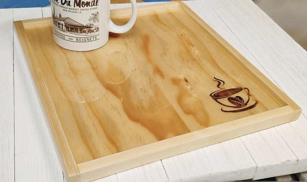Thumbnail: Angled, left view of handmade espresso coffee serving board with an engraved silhouette graphic of a steaming hot espresso coffee cup. The beautiful, natural wood grain is stunning thanks to a clear, food safe finish.