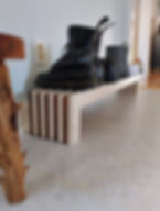 Scandinavian Style with Alternating white and brown shoe organizer at lower left angle