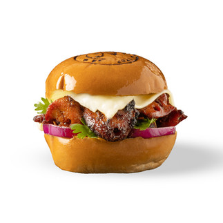 BBQ chicken burger with fresh herbs and onions on a glossy brioche bun — clean cut-out food photo for Uber Eats menu.