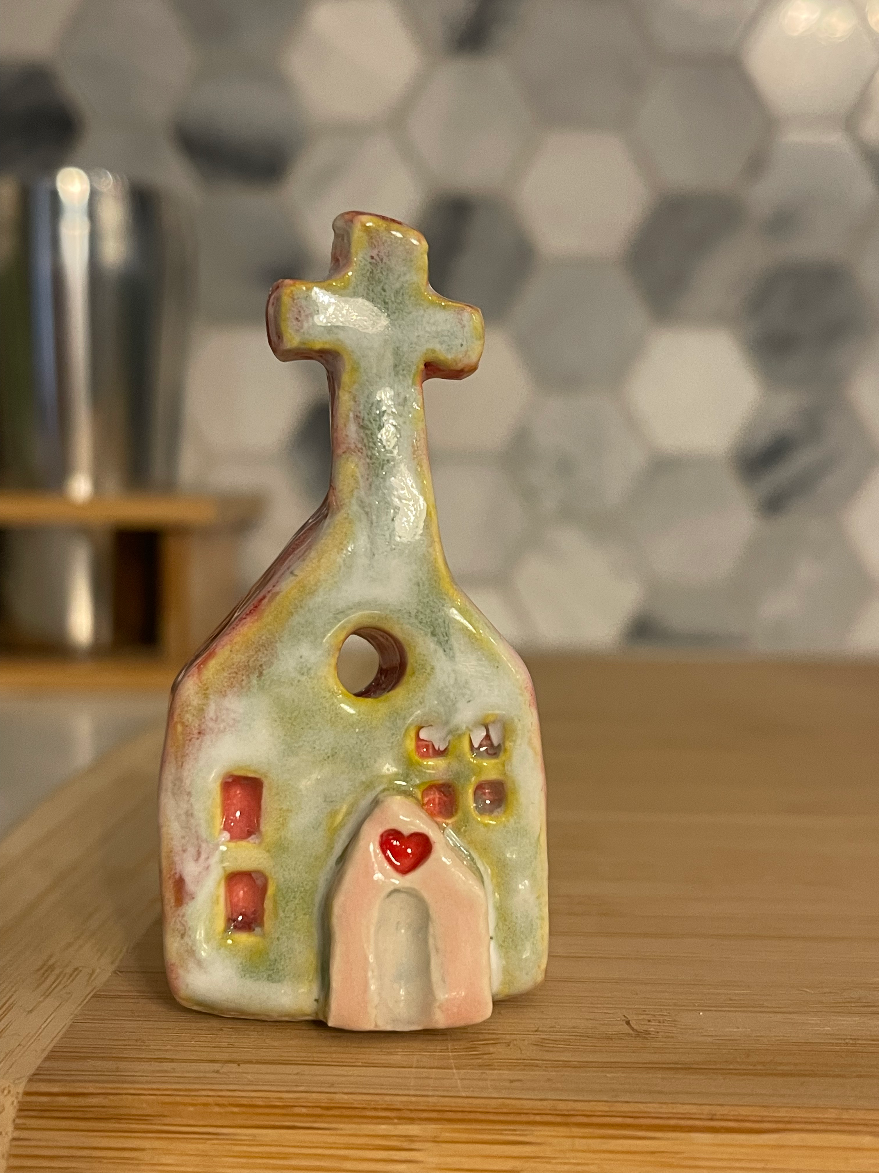 tiny green & pink floating chapel