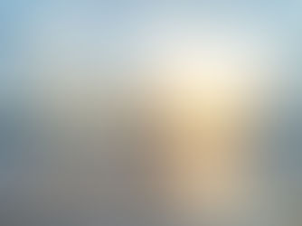 Woman walking on a beach at sunset — image for “What I Wish Someone Had Told Me Before I Turned My Life Upside Down” (EWA Coaching blog).