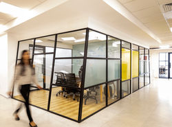 Innovative office interior showcasing round pods and angular spatial planning by Stonehenge Designs