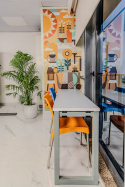 Modern workspace with a bold colour palette and uncluttered layout.