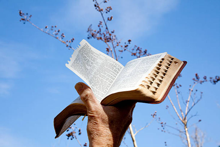 holding bible.jpg