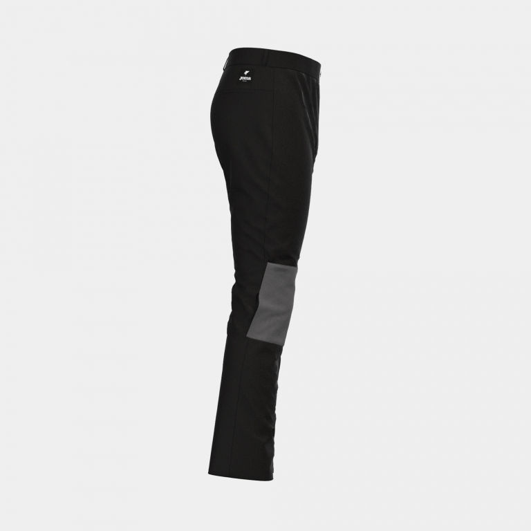 Miniatura: Vista lateral pantalón largo de hombre de la marca Joma modelo explorer bicolor negro y gris