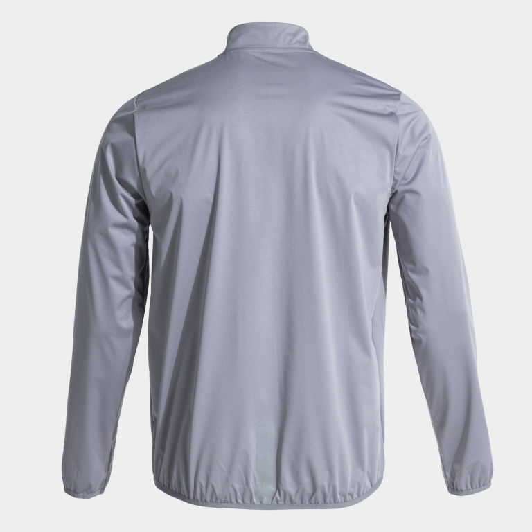 Miniatura: Vista trasera chubasquero marca Joma R-City e color gris