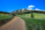 Boulder, Colorado Flat Irons trail head in spring with blue sky.jpg