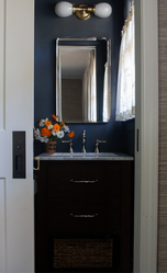 Interior Design Paint color post showing a small moody bathroom painted BM Flint