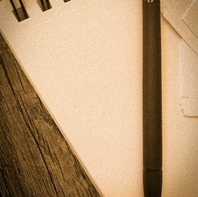 pen on notepad