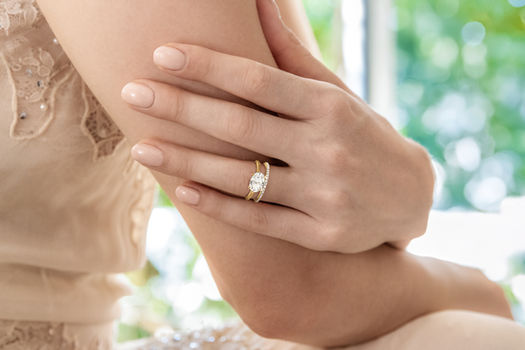 Contemporary East-West Engagement Ring with Double Row Polished and Diamond Shank from K. Hollis Jewelers Signature Bridal Collection.