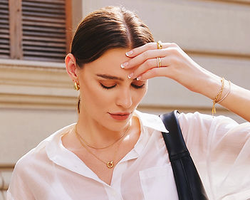 Ania Haie yellow gold jewelry that is perfect for layering