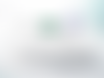 Three engagement rings displayed on a round white platform showing ring sizing alternatives including a spring insert, sizing beads, and a ring guard.