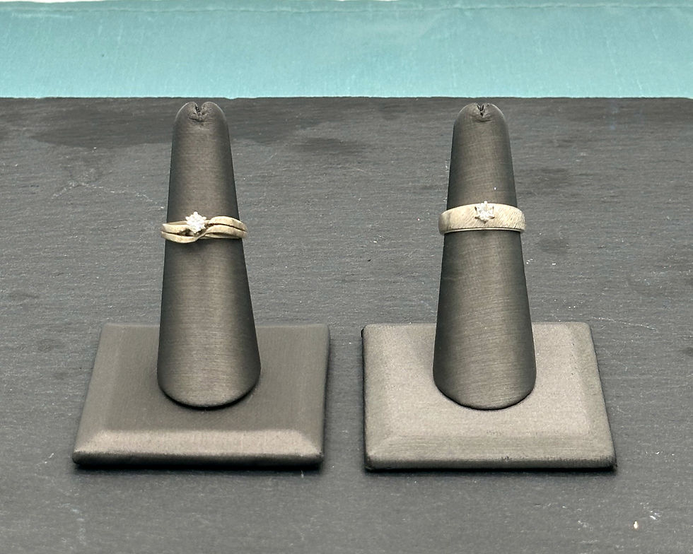 Two solitaire diamond rings before their redesigned at K. Hollis Jewelers
