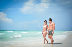 couple walking near the water