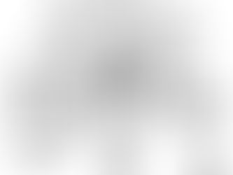 A man panicking as he runs from a house on fire.