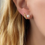 Miniatura: Aretes Rayo con zirconias 
