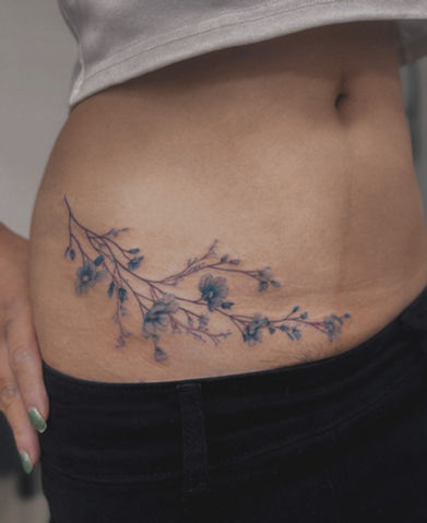 c section scar cover up tattoo done by Miko at l2ink in West Hollywood, CA