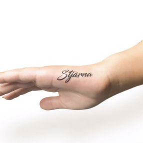 fine line script hand tattoo done by Rose in West Hollywood, CA