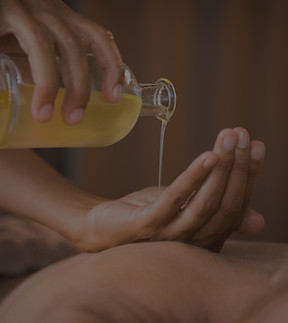 Pouring Massage Oil_edited.jpg