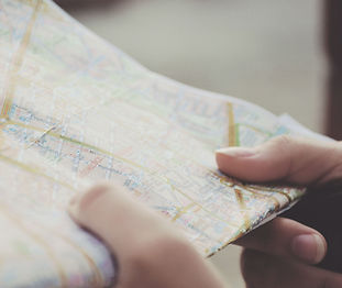 Hands Holding a Map