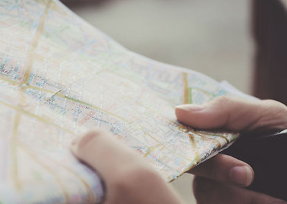 Hands Holding a Map