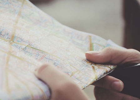 Hands Holding a Map