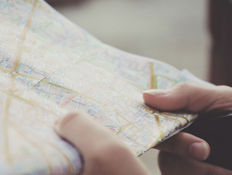 Hands Holding a Map