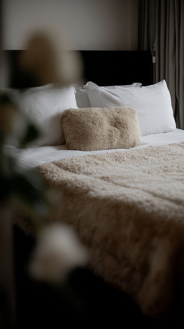 Interior design in Aix-les-Bains: layered natural textiles, soft diffused light and tactile calm, shaped through nuance. Lobanova Architecture & Interior Design.