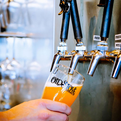Pouring an Old Stove Beer from a tap