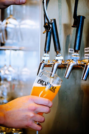 Pouring an Old Stove Beer from a tap