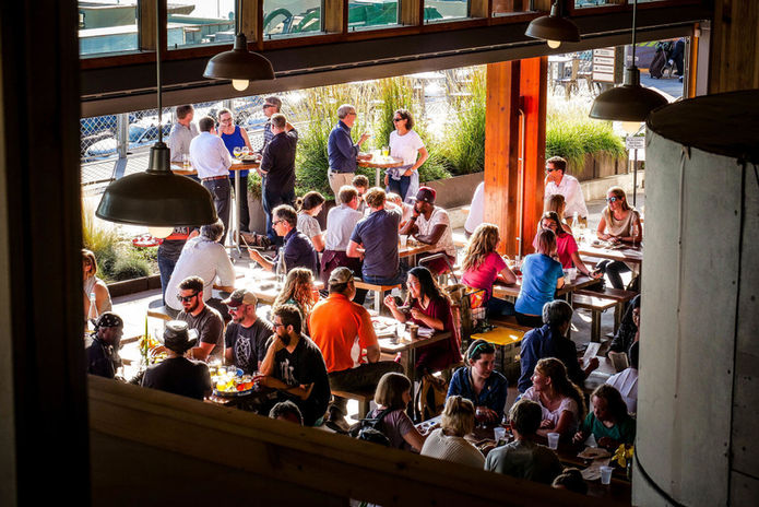 People gathered in the Pike Place dining area