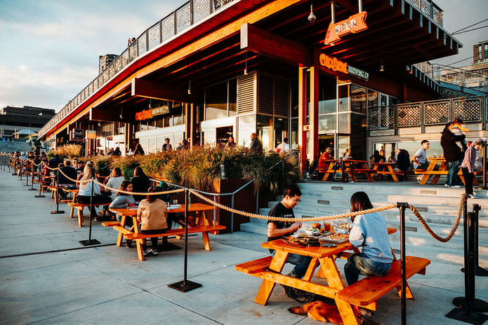 People gathered on the Pike Place Patio