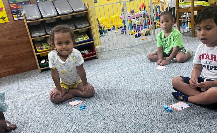 Eye-level view of children engaged in a hands-on science experiment