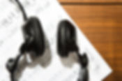 Headphones and sheet music