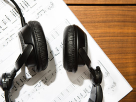 Headphones and sheet music